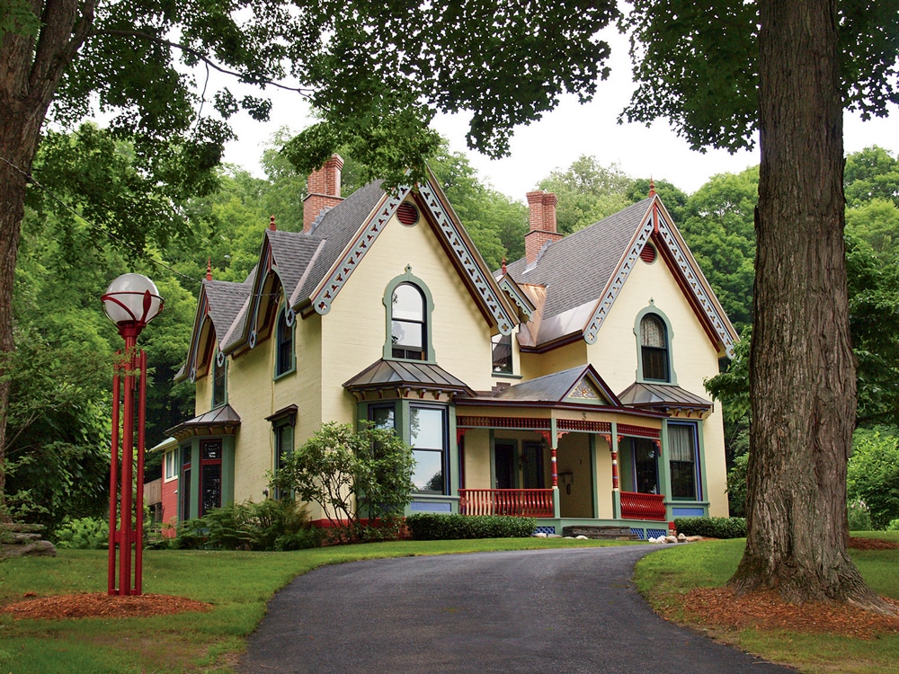 The home’s ornate Victorian details are picked out in five different trim colors.