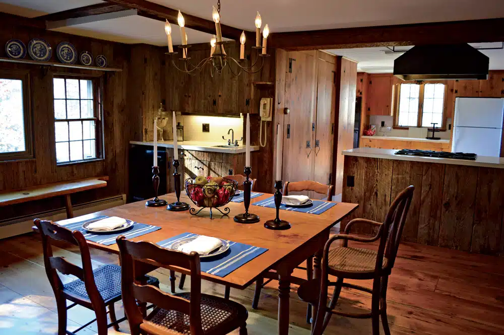 Among the home’s historic details is original wide-board pine flooring.