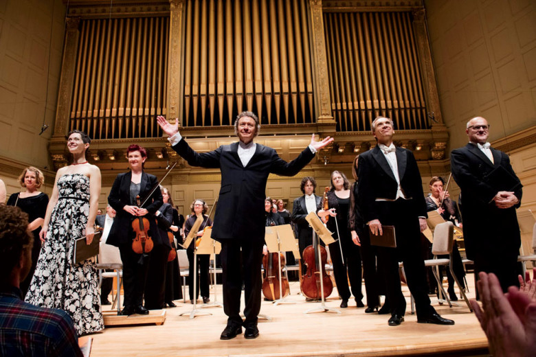 The Handel and Haydn Society’s Messiah is one of Boston’s most-loved holiday traditions. Here, Artistic Director Harry Christophers (center), the musicians, and the singers take a bow. 