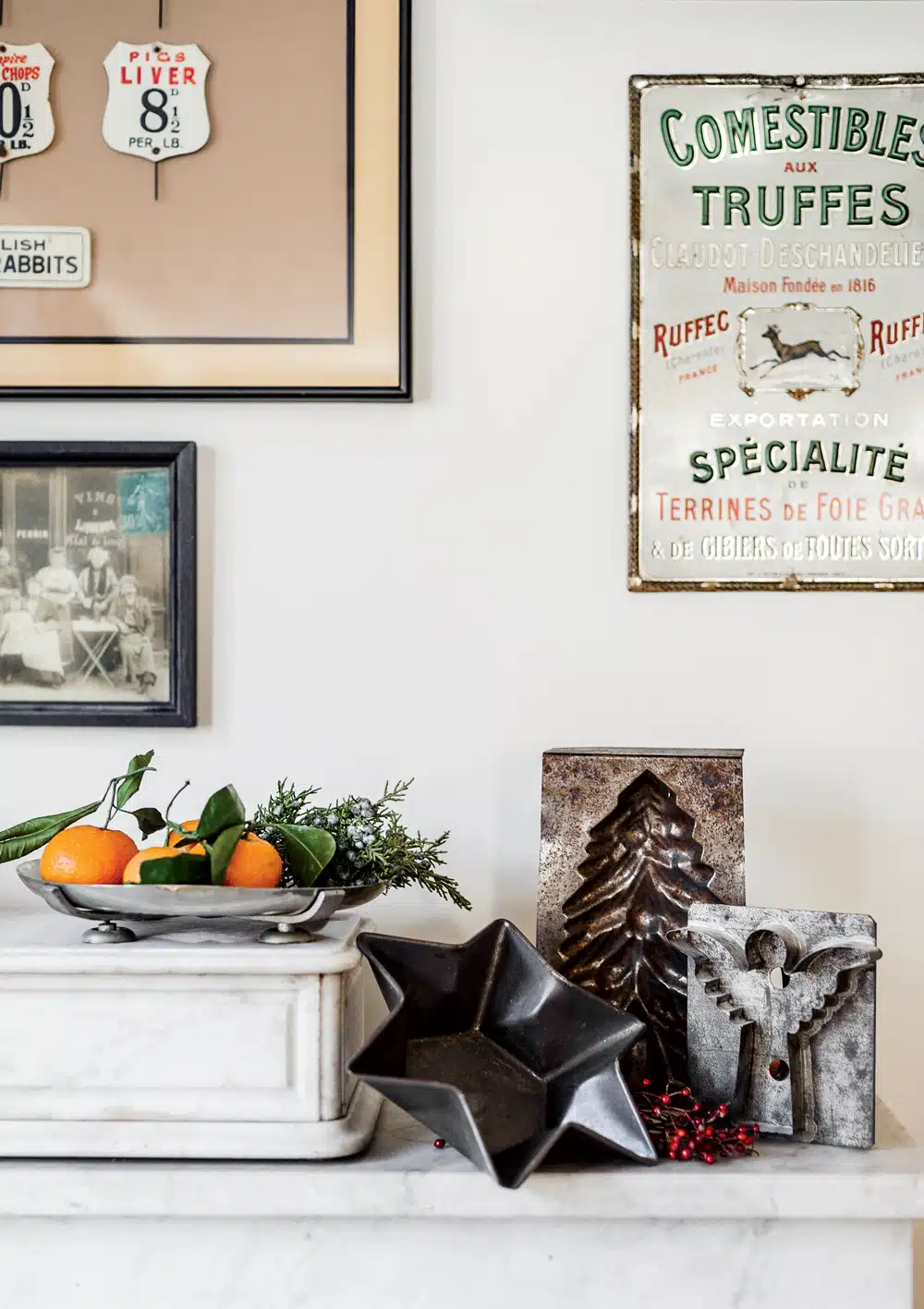 Among the culinary artifacts that fill the Brass sisters’ Cambridge, Massachusetts, home: assorted vintage metalware and an early 20th-century French specialty-foods sign.