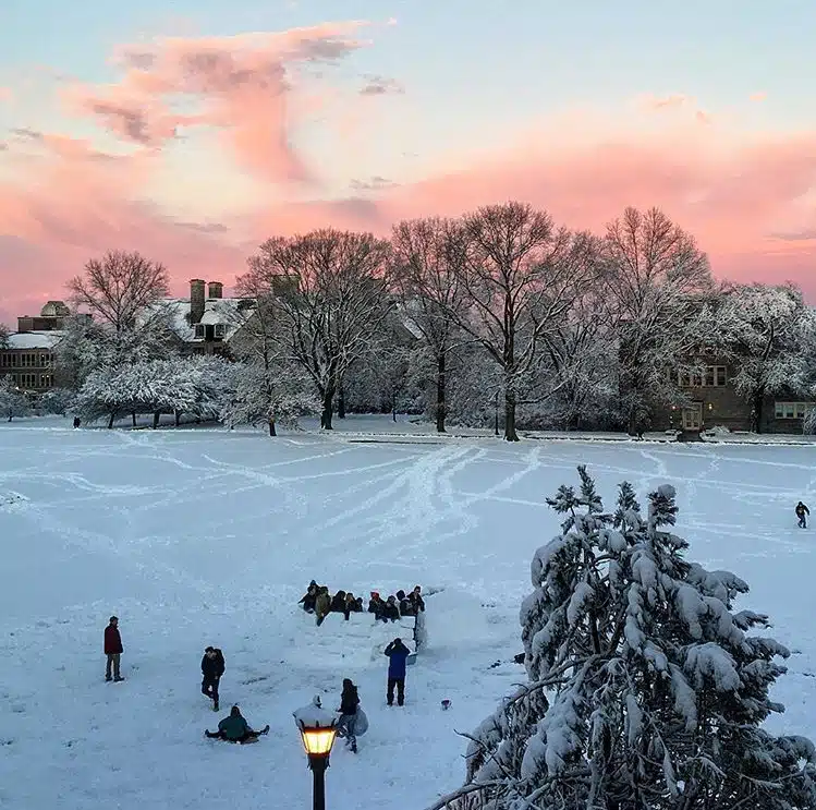 Students at Connecticut College making igloos.