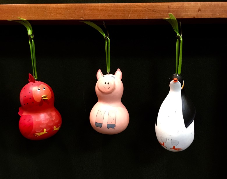 Hand painted gourd ornaments by Julia Emilo. 