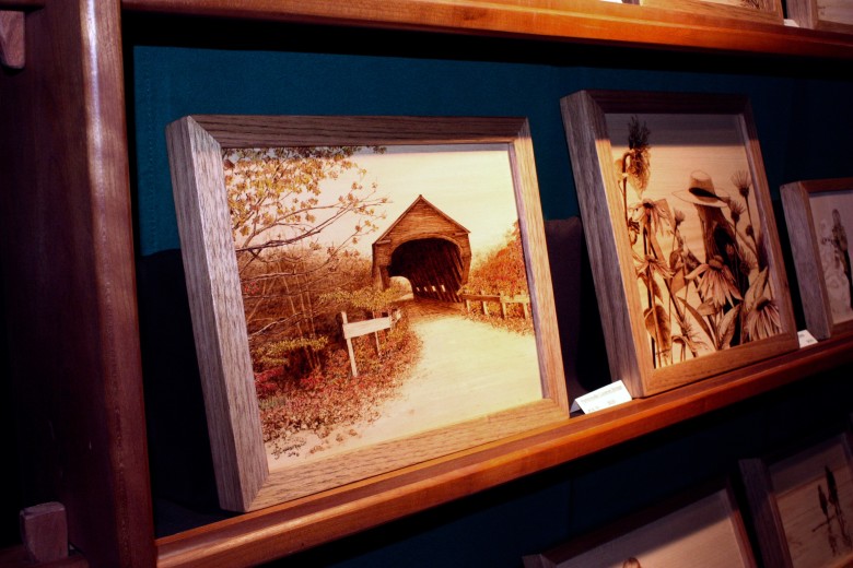 Woodburning art depicting serene Vermont scenes by Cannistraci Woodworks