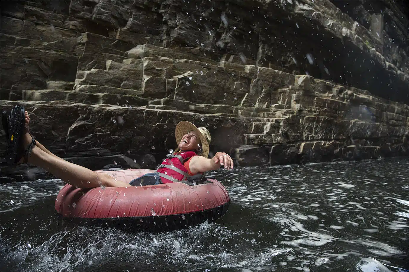 Elizabeth takes it all in as we float through the high stone cliffs of Ausable Chasm on a hot summer day.