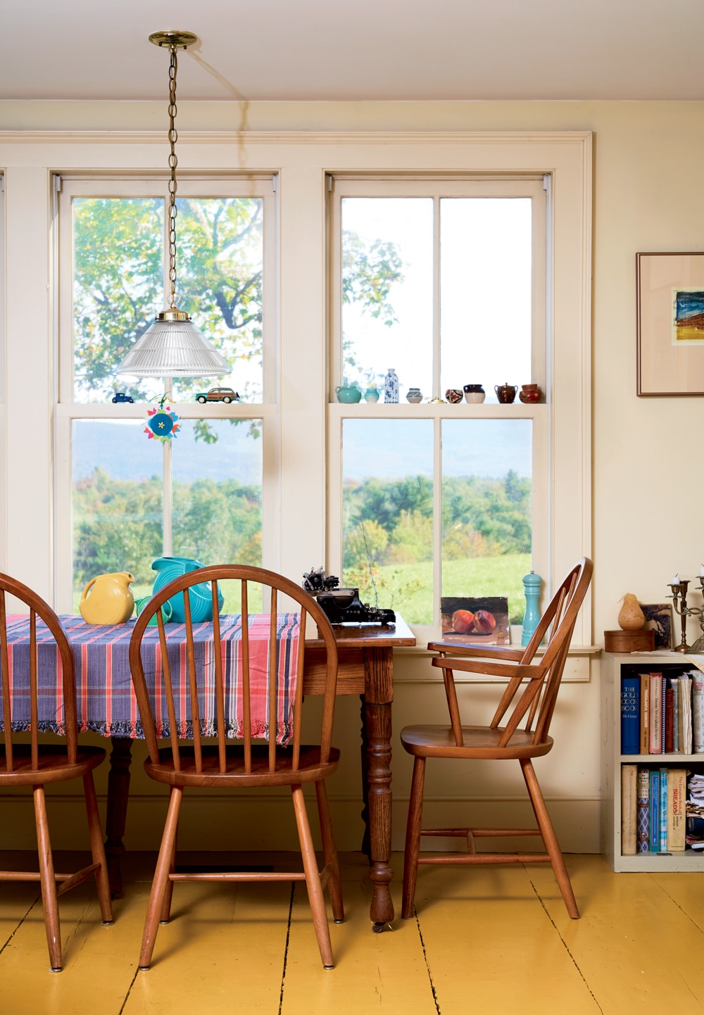 One of Edie’s favorite writing spots: the sunny kitchen table with its views of meadow and mountain. 
