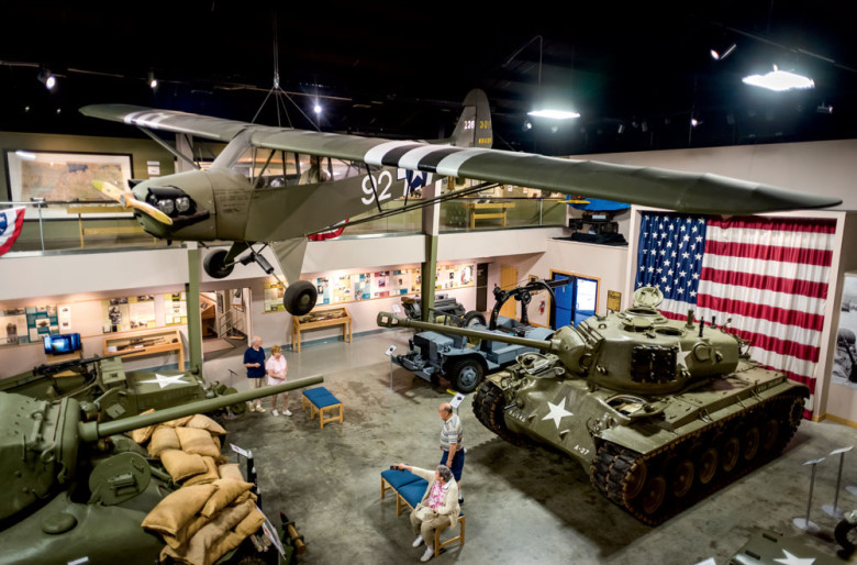 The vehicle gallery holds center stage, but it is the context provided by the memorabilia and period exhibits that truly sets the Wright Museum apart.
