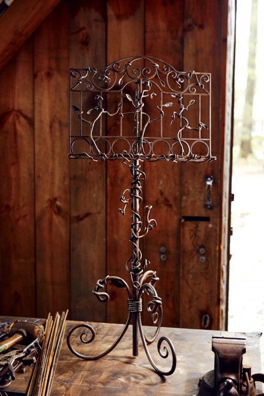Functional yet artistic: A hand-forged music stand is enhanced with graceful tendrils.