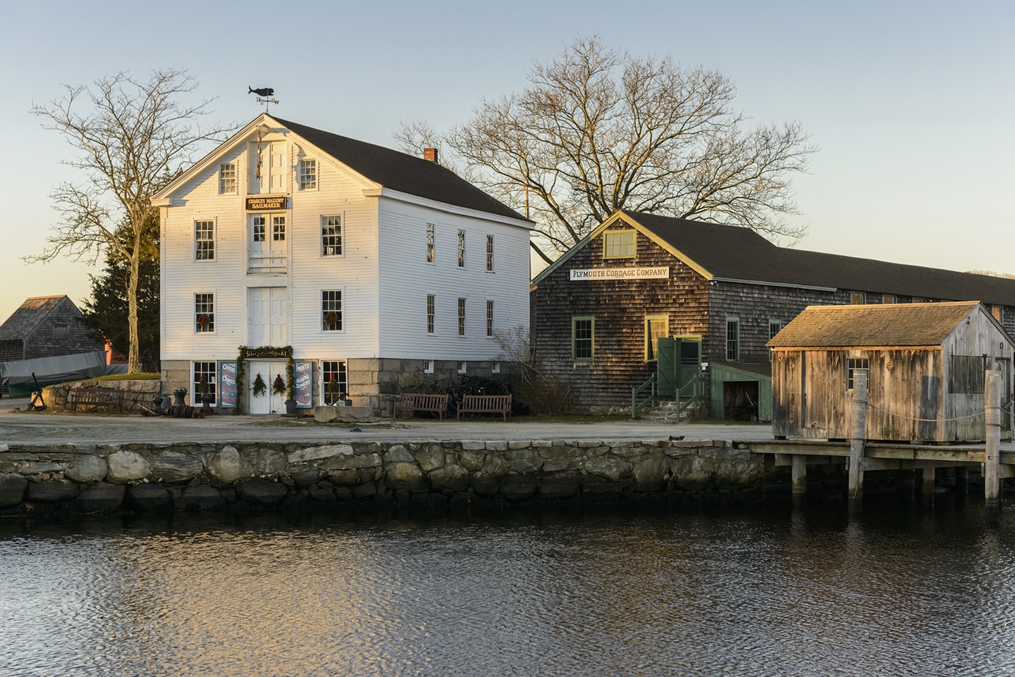 Sunrise illuminates the historic architecture at Mystic Seaport.