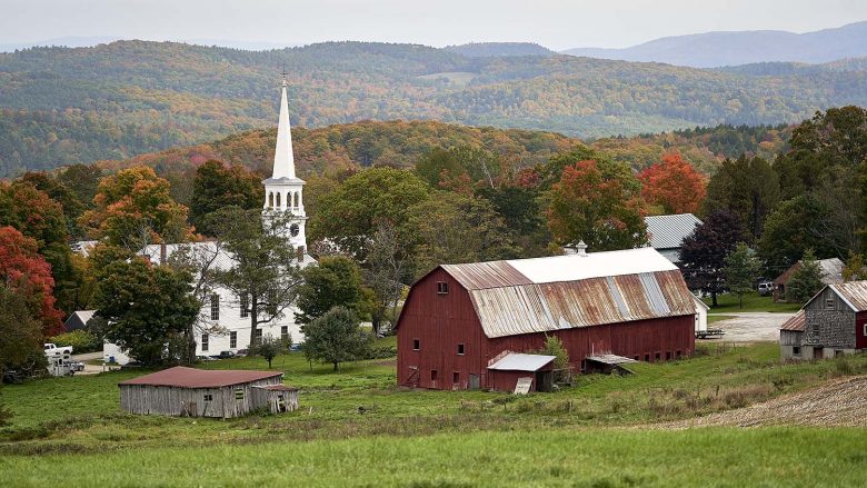 Barn and White Steeple in Fall