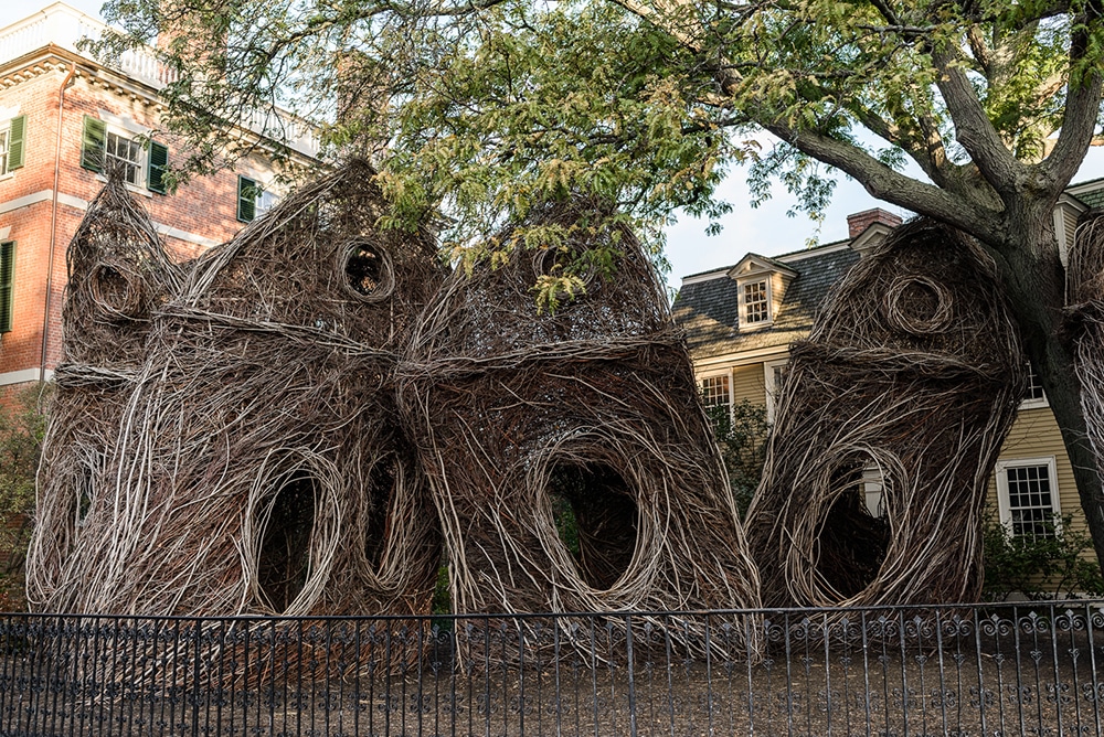 Outdoor sculptural art installation on the Crowninshield-Bentley Lawn at the Peabody Essex Museum. Stickwork was created by artist Patrick Dougherty bending and weaving saplings into architectural structures related to the landscape and built environment.