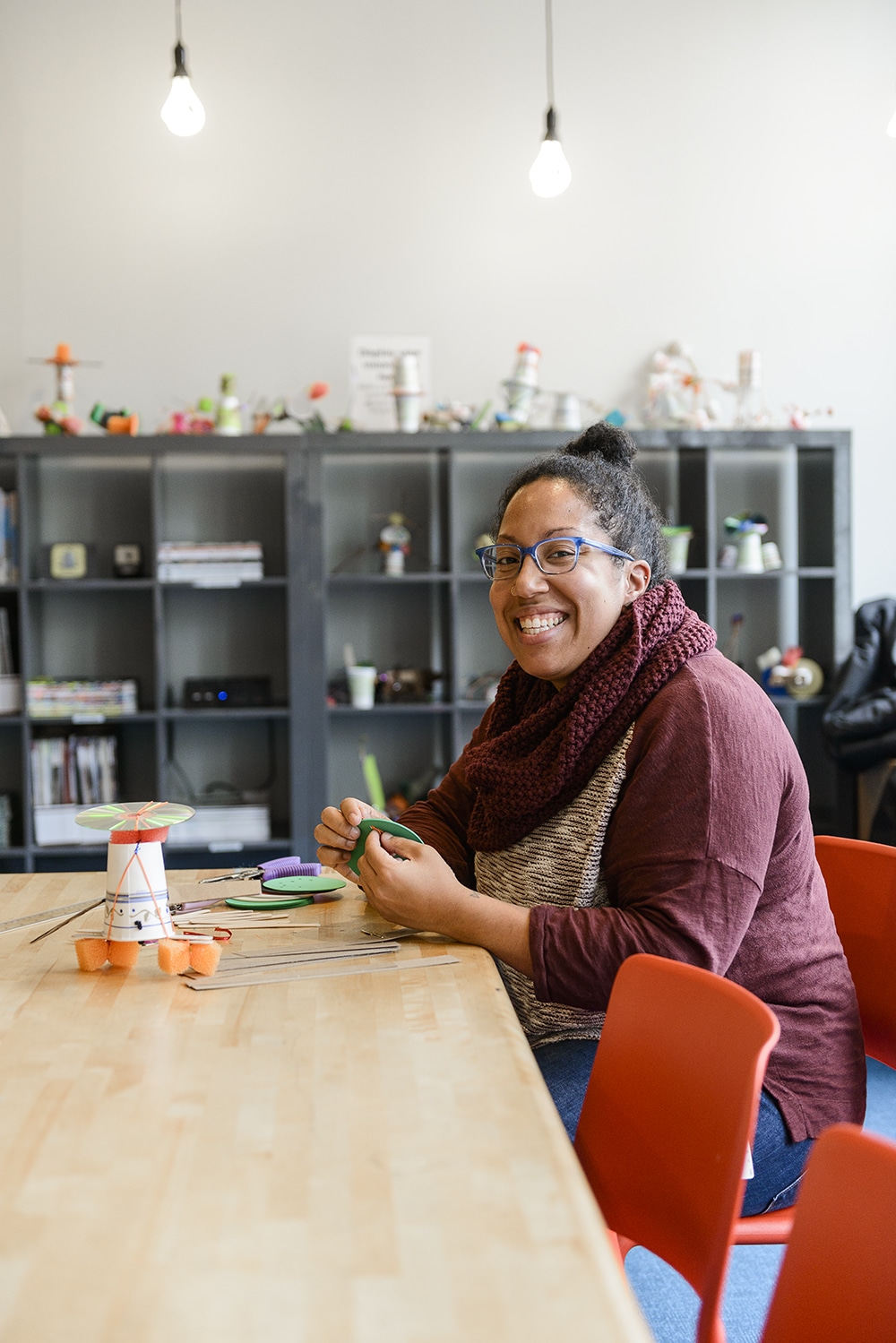 Doneeca Thurston in the Maker Lounge at the Peabody Essex Museum where she is the Creative Engagement Producer.