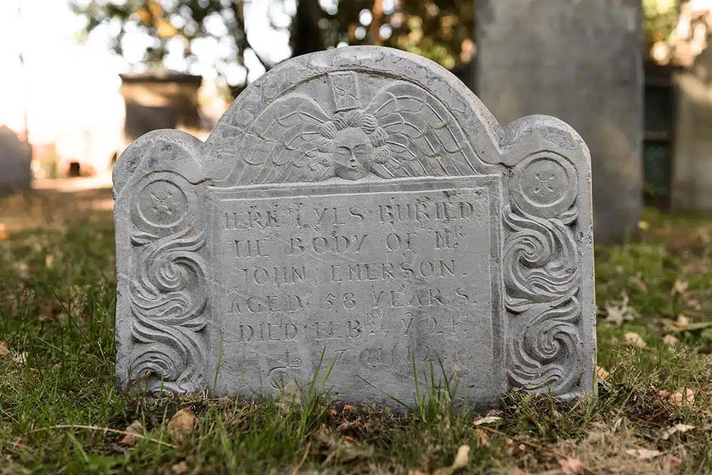 Gravestone of John Emerson, aged 58, at Burying Point Cemetery on Charter Street.