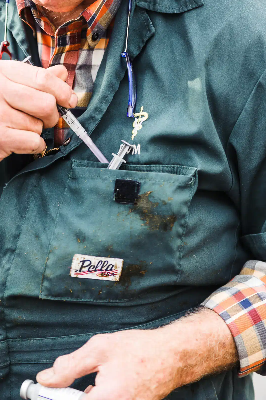 Close-up of DVM Stuwe’s coveralls.
