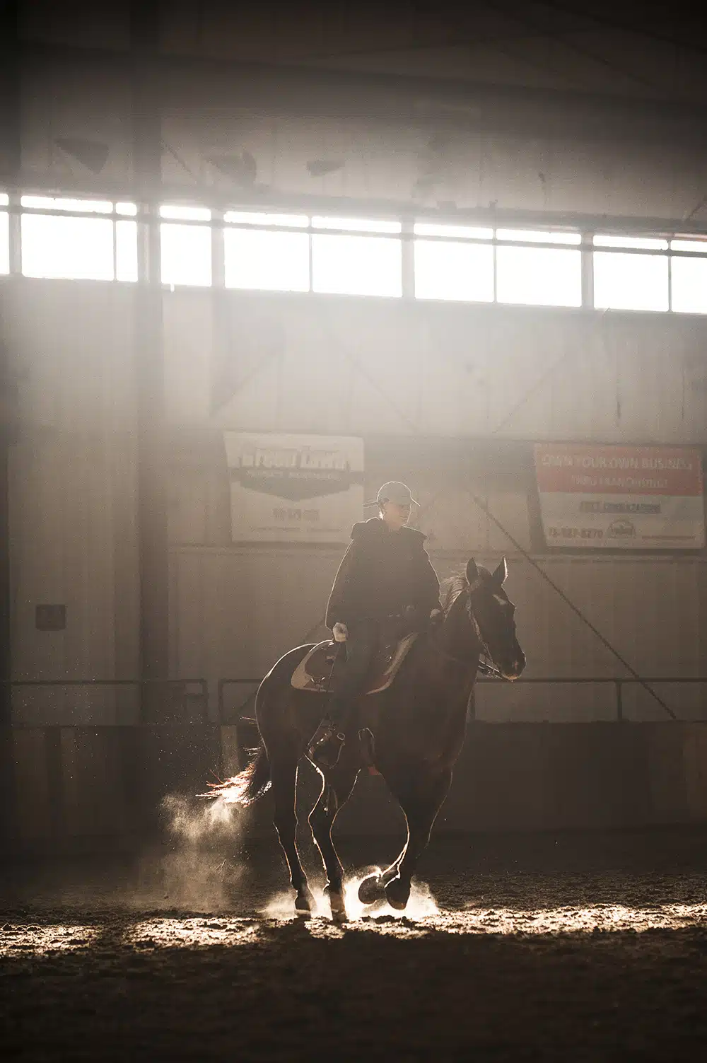 Cathy Hill from CJ's Ranch warming up her horse Bridger before the start of the shows.
