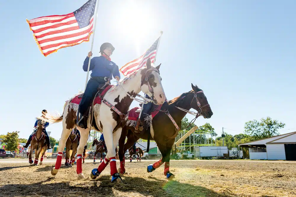“There’s a certain pride among folks who come to the fair to compete,” Fleming says. “They spend the year honing their skills, many of which have been passed down through generations, all in preparation for their moment in the spotlight. Horsemanship is one of my favorite things to watch at the fair—from the Royal Canadian Mounted Police, who make an annual stop at Topsfield, to the local Barnstable Barn Burners show team, above.”