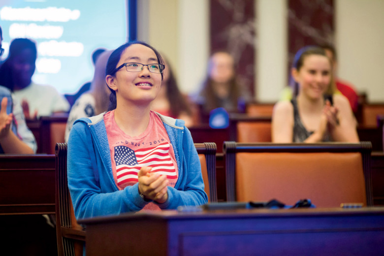 Young visitors become lawmakers for a day.