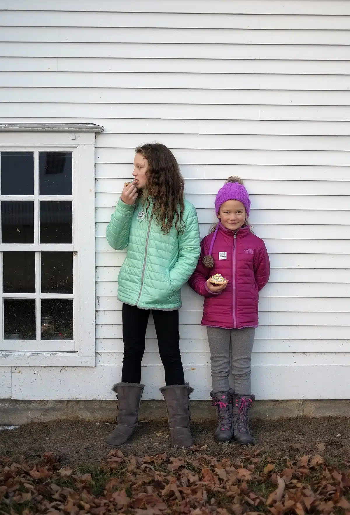 The girls outside the Dwelling House's kitchen window.
