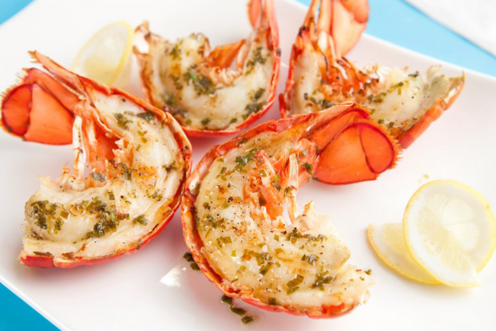 Cooking lobster tails (like these grilled lobster tails) is easier and less expensive than cooking the whole lobster.