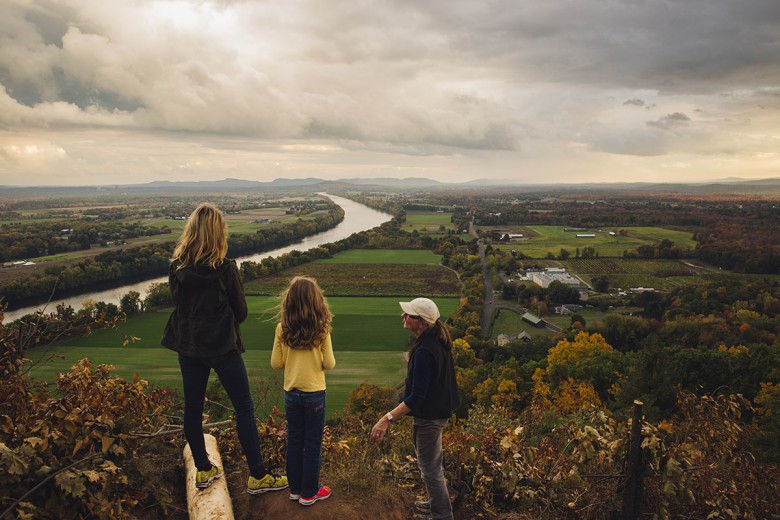 Louise & Suzanne Mahoney with Adelaide Jacques take in the view of the Connecticut River and the Pioneer Valley from the summit of Mount Sugarloaf.