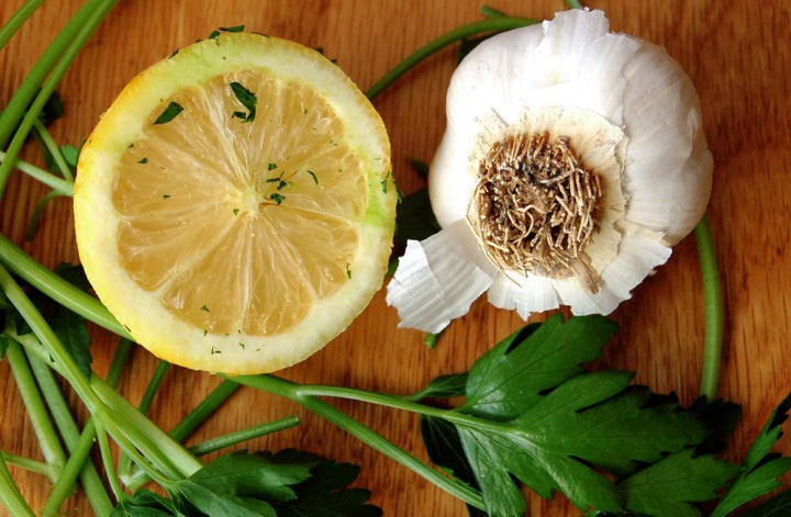 Lemon and garlic are two good places to start when wondering how to get rid of fleas on your pets.