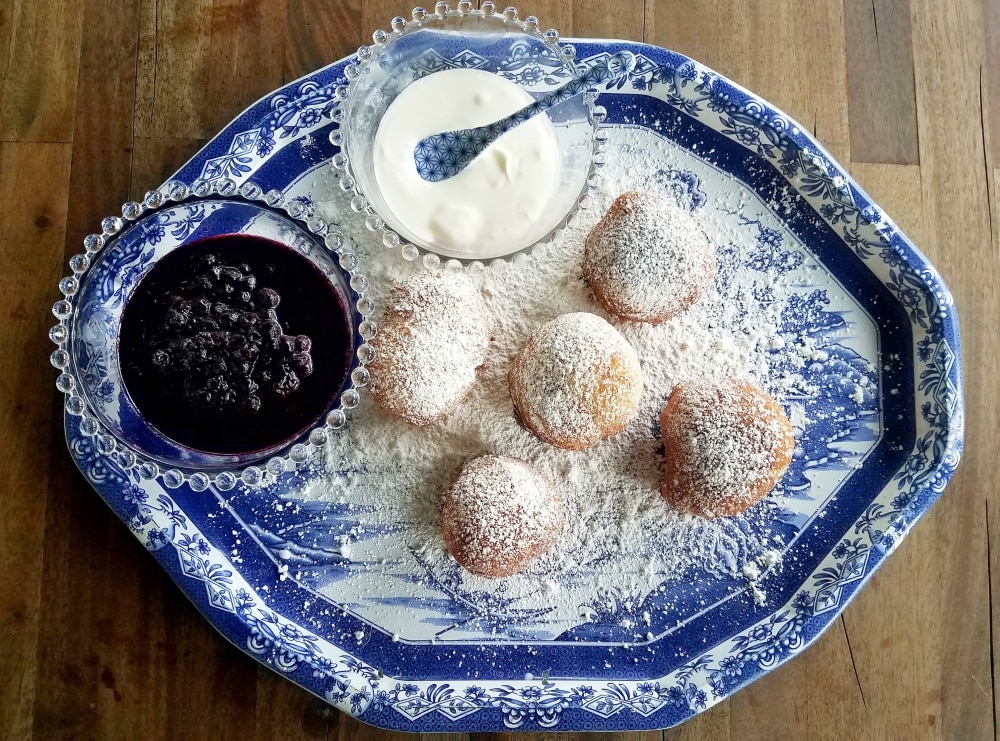 homemade doughnuts with blueberry compote