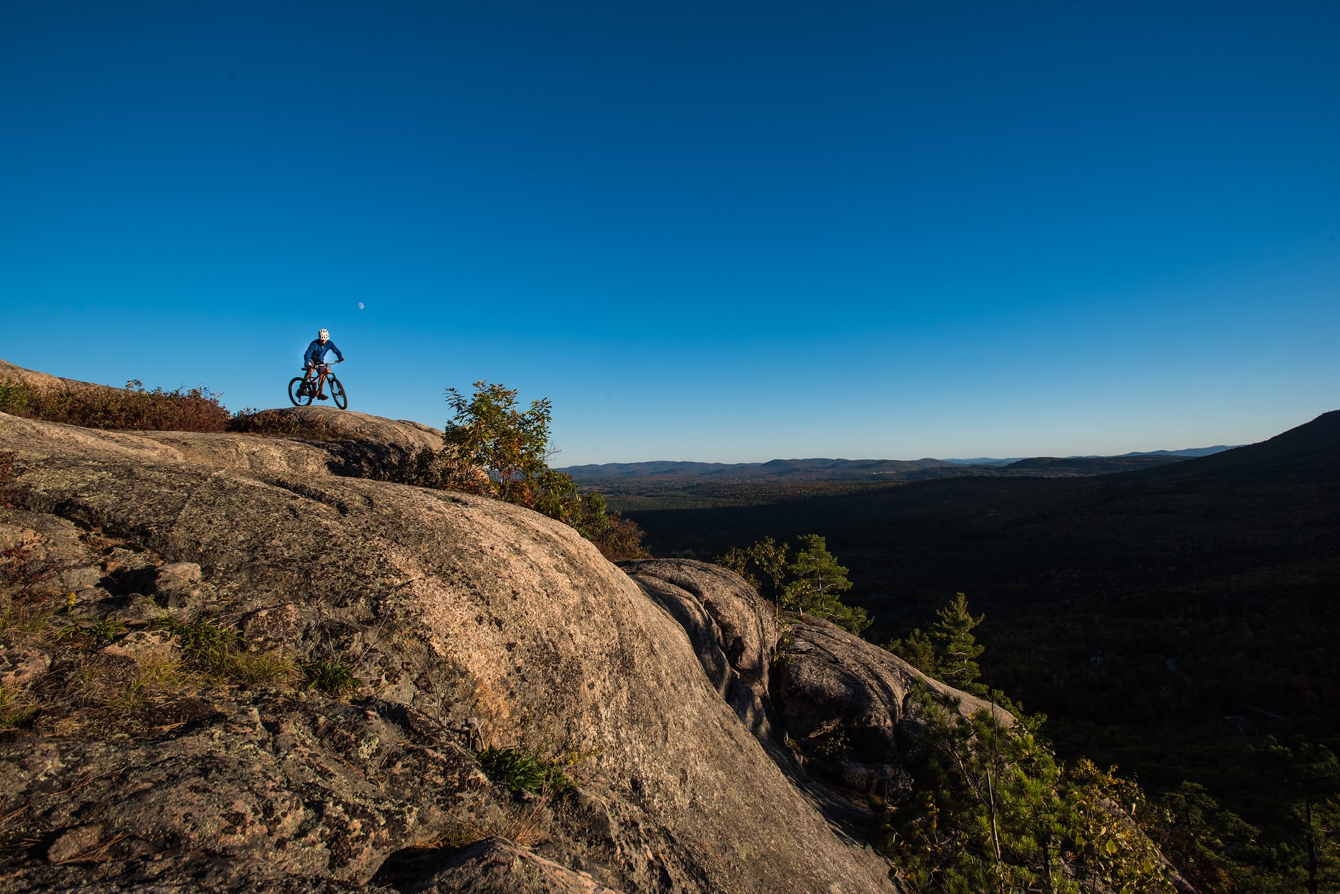 Alex Leich on the bare granite slabs of Whitehorse Ledge, a mecca for climbers and bikers, in North Conway, New Hampshire. 