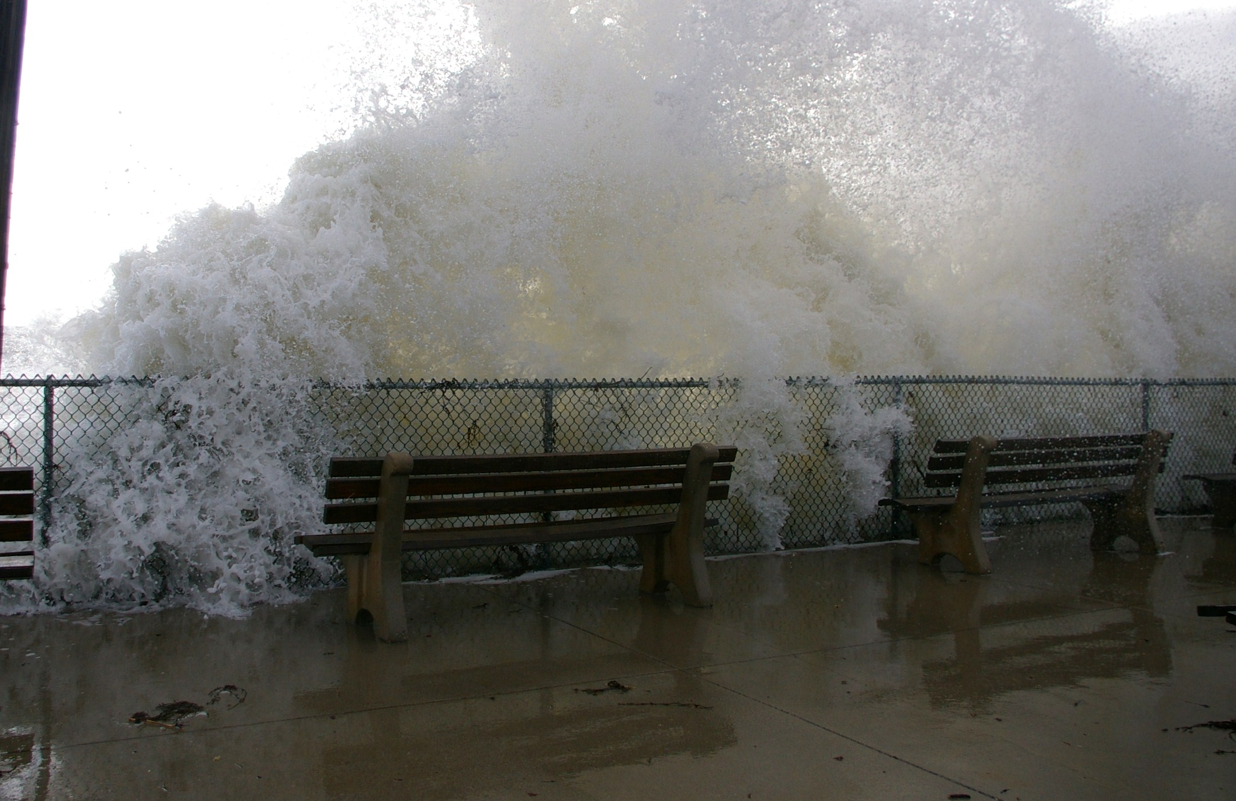 Waves Breaking Over Sea Wall In Storm (user submitted)