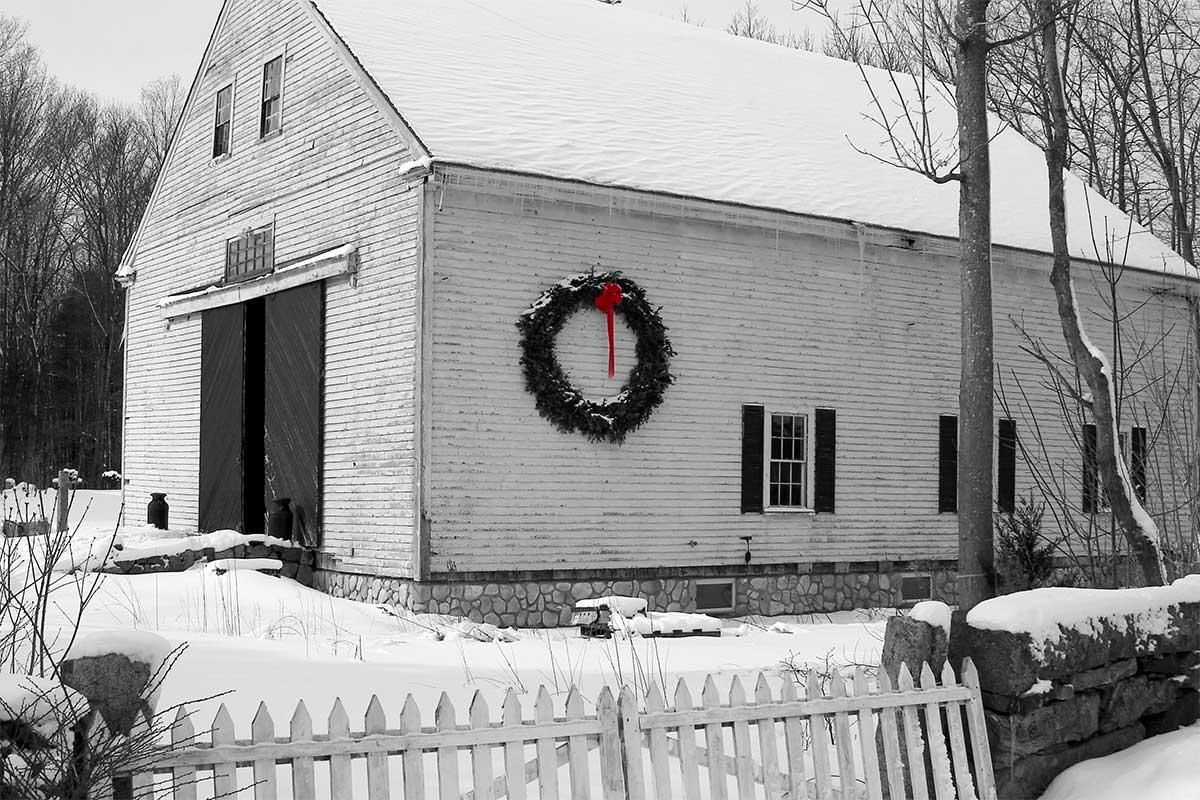 Black and white barn with red bow (user submitted)