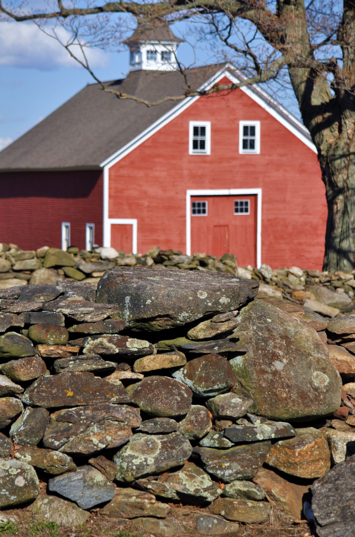 Rock Wall And Red Barn (user submitted)