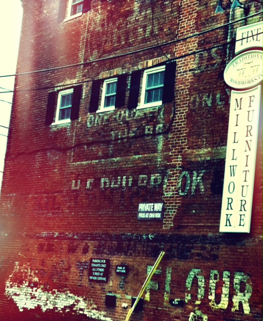 Ghost Signs On Old Warehouse, Portsmouth (user submitted)