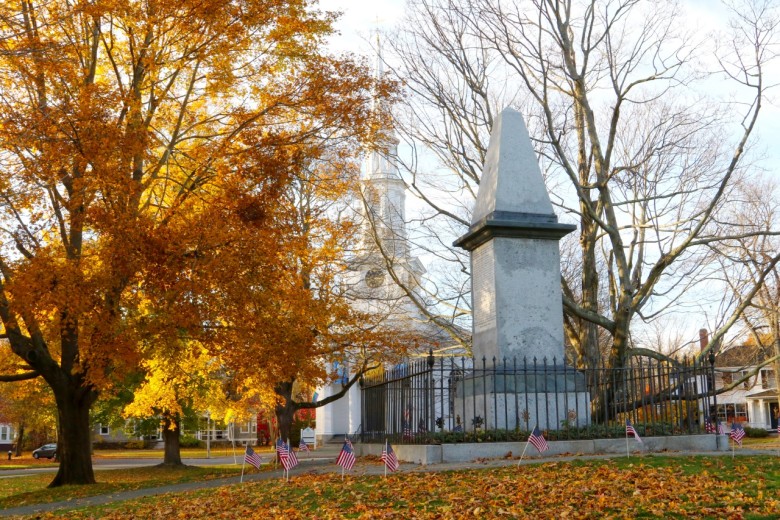 The Revolutionary Monument and old church on the common.