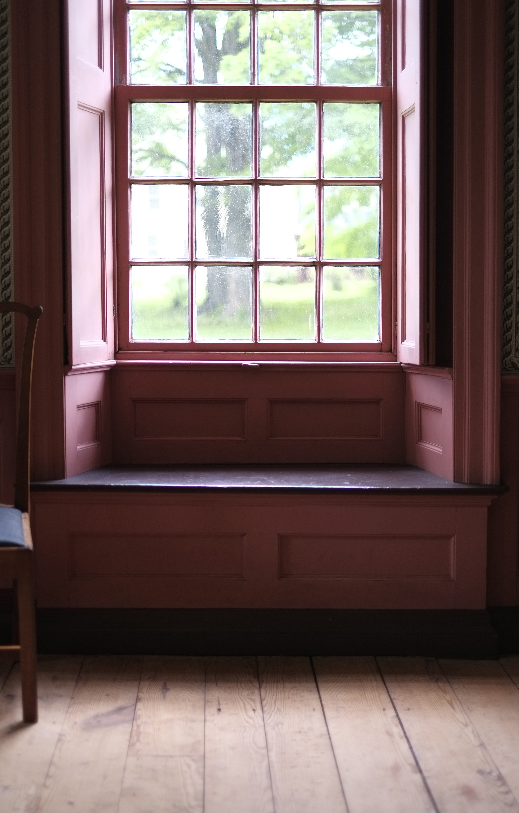 Window seat and interior shutters in the library room at Wells-Thorn House.