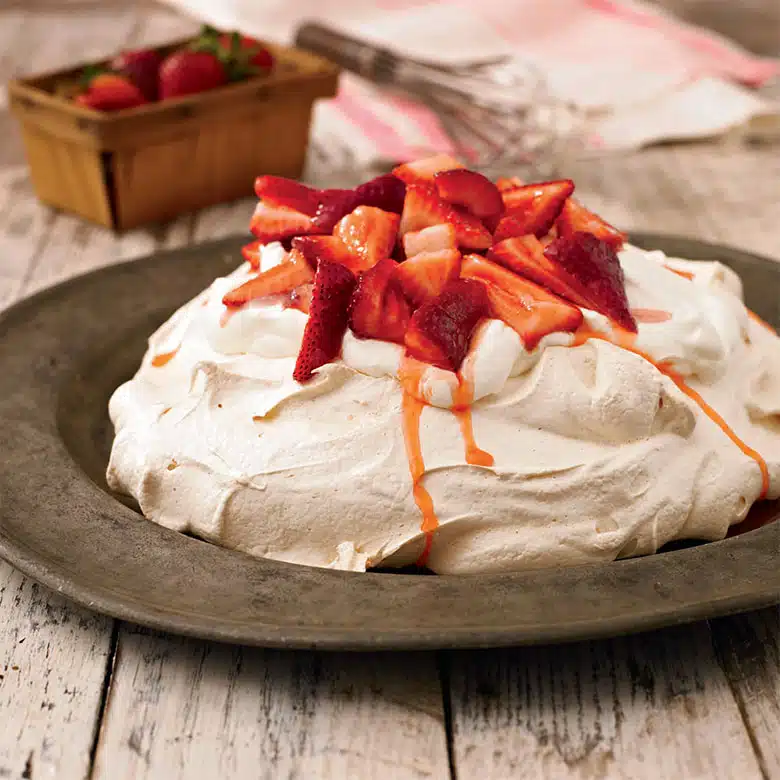 Pavlova with Fresh Strawberries and Whipped Cream