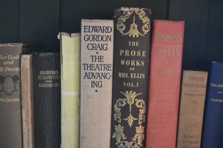 The library shelves at the Inn are filled with antique books. 