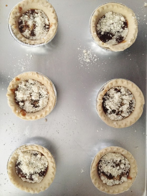 Mini pies are filled and ready to go in the oven! We put them in ten minutes before taking out the larger pie at 350 degrees.