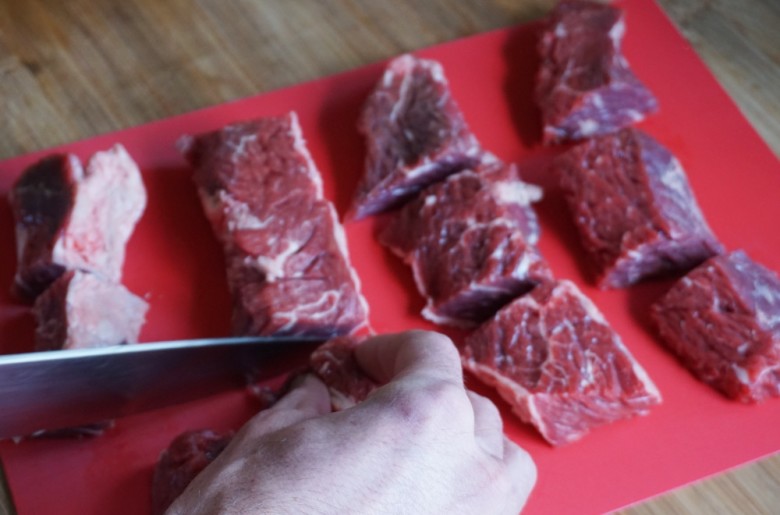 First, cut the steak into grill-friendly tips. 